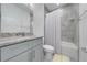 Bathroom with tub shower, vanity, and neutral finishes at 2909 Annalee Rd, Saint Cloud, FL 34771