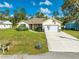 Charming single-Gathering home with a two-car garage and green lawn at 2909 Annalee Rd, Saint Cloud, FL 34771