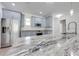 Kitchen featuring stainless steel appliances, granite countertops, ample cabinet space, and kitchen island at 2909 Annalee Rd, Saint Cloud, FL 34771