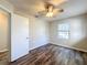 Bedroom with ceiling fan and window at 32122 Hickory Ln, Sorrento, FL 32776