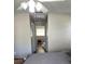 Bright hallway with access to bedrooms and stairs at 32122 Hickory Ln, Sorrento, FL 32776