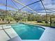 Relaxing screened pool in backyard setting at 32122 Hickory Ln, Sorrento, FL 32776