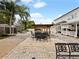 Spacious backyard with patio furniture and pergola at 352 Radisson Pl, Oviedo, FL 32765