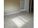 Bedroom with tile floors and access to bathroom at 4910 Huppel Ave, Orlando, FL 32811