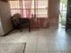 Bright living room with tile floors at 4910 Huppel Ave, Orlando, FL 32811