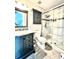 Bathroom features tiled shower, vanity, and tiled floors at 144 Rose Hill Trl, Sanford, FL 32773