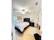 Bedroom with wood-look floors, ceiling fan, and closet at 144 Rose Hill Trl, Sanford, FL 32773