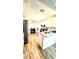 Kitchen area featuring white cabinets and breakfast bar at 144 Rose Hill Trl, Sanford, FL 32773