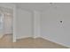 Bright living room with durable hardwood flooring, neutral walls and lots of natural light at 207 Bull Frog Ln, Umatilla, FL 32784