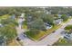 This aerial view showcases a home nestled in a neighborhood full of mature trees at 3000 Cashmere Dr, Orlando, FL 32827