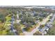 Birds eye view of a well-treed suburban neighborhood with tree-lined streets and mature landscaping at 3000 Cashmere Dr, Orlando, FL 32827
