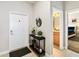 Inviting entryway with stylish decor, leading to bedroom and bathroom at 4891 Clock Tower Dr, Kissimmee, FL 34746