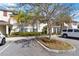 Charming condo community featuring well-maintained landscaping and a convenient parking area at 4891 Clock Tower Dr, Kissimmee, FL 34746