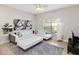 Bright living room featuring a comfortable sectional sofa, plush rug, and ample natural light at 4891 Clock Tower Dr, Kissimmee, FL 34746