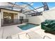 Backyard features pool with spa, patio area, and a BBQ at 4891 Clock Tower Dr, Kissimmee, FL 34746