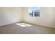 Bedroom featuring a large window, wood-look tile flooring, and neutral wall paint at 195 Bull Frog Ln, Umatilla, FL 32784