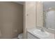 Cozy bathroom with a clean, well-lit vanity and a neutral color scheme at 2078 Cypress Bay Blvd, Kissimmee, FL 34743