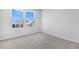 Bedroom with neutral carpet, neutral paint and great outdoor views from the window at 1496 August Gray Dr, Kissimmee, FL 34744