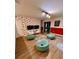 Fun game room with Mickey Mouse wall, featuring a pool table, mounted TVs, and colorful decor, perfect for Gathering entertainment at 1676 Moon Valley Dr, Davenport, FL 33896