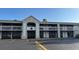 Two-story building exterior featuring a stucco facade, balconies with white railings, and parking in front at 5245 W Irlo Bronson Memorial Hwy # 160, Kissimmee, FL 34746