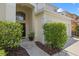 Charming home entrance with lush landscaping at 121 Madiera Beach Blvd, Kissimmee, FL 34746