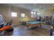 Fun game room with pool table, air hockey, and arcade games for residents' enjoyment at 121 Madiera Beach Blvd, Kissimmee, FL 34746