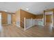 Upstairs hallway with wood floors and multiple bedroom access at 121 Madiera Beach Blvd, Kissimmee, FL 34746