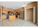 Large kitchen featuring stainless steel appliances, ample counter space, and a center island at 121 Madiera Beach Blvd, Kissimmee, FL 34746