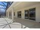 A covered patio with ceiling fans and ample space for outdoor entertaining at 121 Madiera Beach Blvd, Kissimmee, FL 34746
