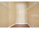 Bright walk-in closet is ready with shelving for organization at 121 Madiera Beach Blvd, Kissimmee, FL 34746