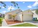 Well-maintained one-story home featuring a two-car garage, landscaped yard, and neutral color palette at 1548 Tiverton Blvd, Winter Garden, FL 34787