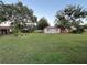 Large backyard with detached workshop and spacious grassy area at 2867 Longleaf Ct, Kissimmee, FL 34746