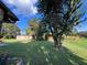 Spacious backyard with mature trees and grassy area at 2867 Longleaf Ct, Kissimmee, FL 34746