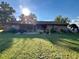 Large backyard with patio, grill, and lush landscaping at 2867 Longleaf Ct, Kissimmee, FL 34746