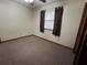 Simple bedroom with carpet, window, and closet at 2867 Longleaf Ct, Kissimmee, FL 34746