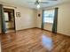 Spacious bedroom with wood flooring and ensuite bathroom at 2867 Longleaf Ct, Kissimmee, FL 34746