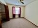 Bedroom with double closet and carpet flooring at 2867 Longleaf Ct, Kissimmee, FL 34746