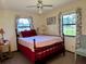 Charming bedroom with double bed and window views at 2867 Longleaf Ct, Kissimmee, FL 34746