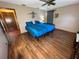 Bedroom with two twin beds and wood floors at 2867 Longleaf Ct, Kissimmee, FL 34746