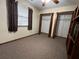 Spacious bedroom with ample closet space and neutral carpeting at 2867 Longleaf Ct, Kissimmee, FL 34746