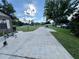 Long driveway with boat parked, providing ample parking space at 2867 Longleaf Ct, Kissimmee, FL 34746