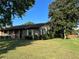 Brick ranch house with lush landscaping at 2867 Longleaf Ct, Kissimmee, FL 34746