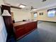 Large office with L-shaped desk and ceiling fan at 2867 Longleaf Ct, Kissimmee, FL 34746