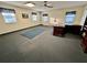 Bright office with multiple windows, ceiling fan, and wood desk at 2867 Longleaf Ct, Kissimmee, FL 34746