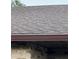 Dark brown asphalt shingle roof in good condition at 2867 Longleaf Ct, Kissimmee, FL 34746