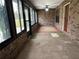 Spacious screened porch with brick flooring and ceiling fan at 2867 Longleaf Ct, Kissimmee, FL 34746