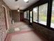 Spacious screened porch with brick flooring and ceiling fan at 2867 Longleaf Ct, Kissimmee, FL 34746