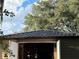 Close up view of a shed with dark metal roof at 2867 Longleaf Ct, Kissimmee, FL 34746