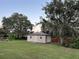 Tan storage shed with double doors at 2867 Longleaf Ct, Kissimmee, FL 34746