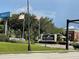 Southern Dunes Golf and Country Club sign on a sunny day near commercial buildings at 1652 Dunes Ct, Haines City, FL 33844